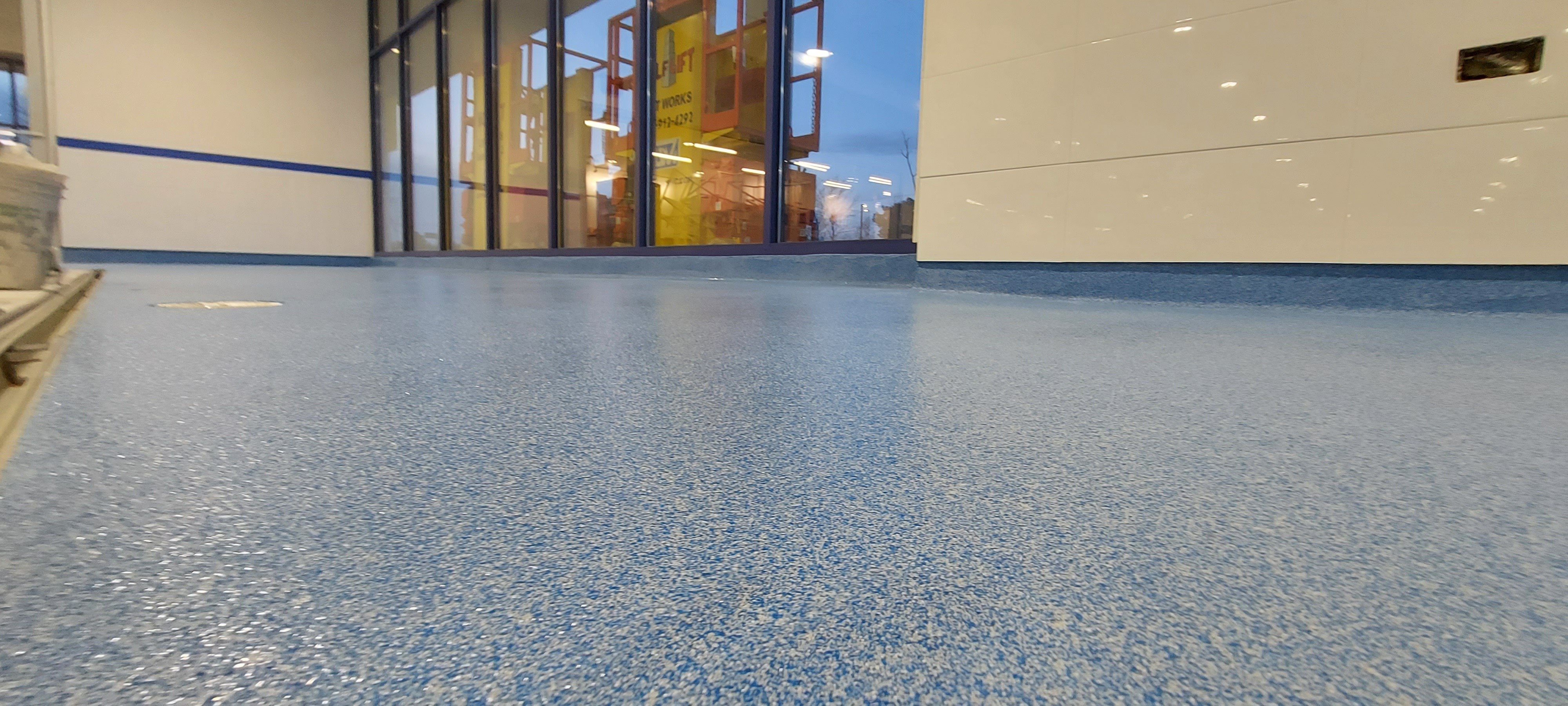 Cove base with flake epoxy coating