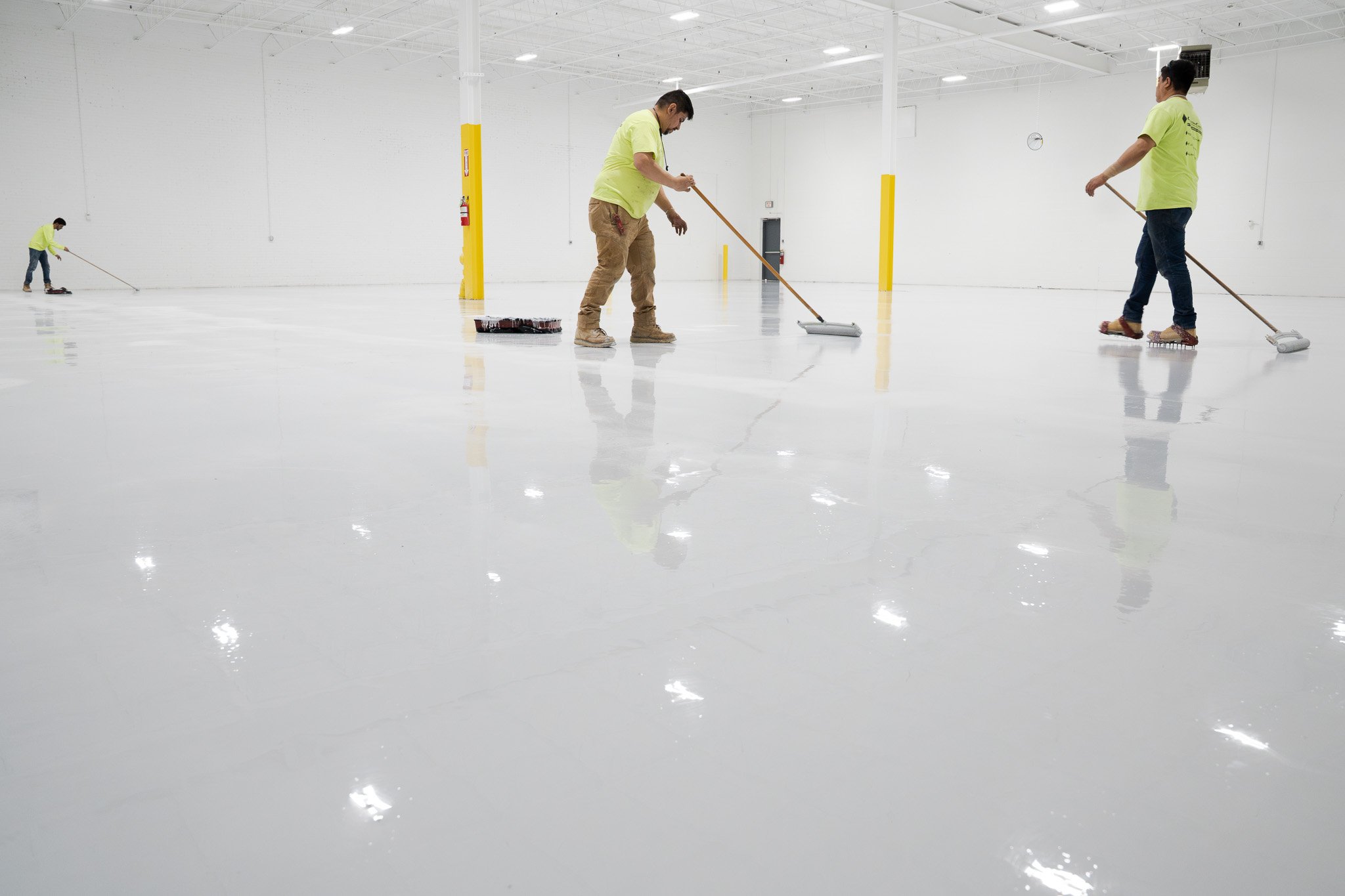 Team installing epoxy
