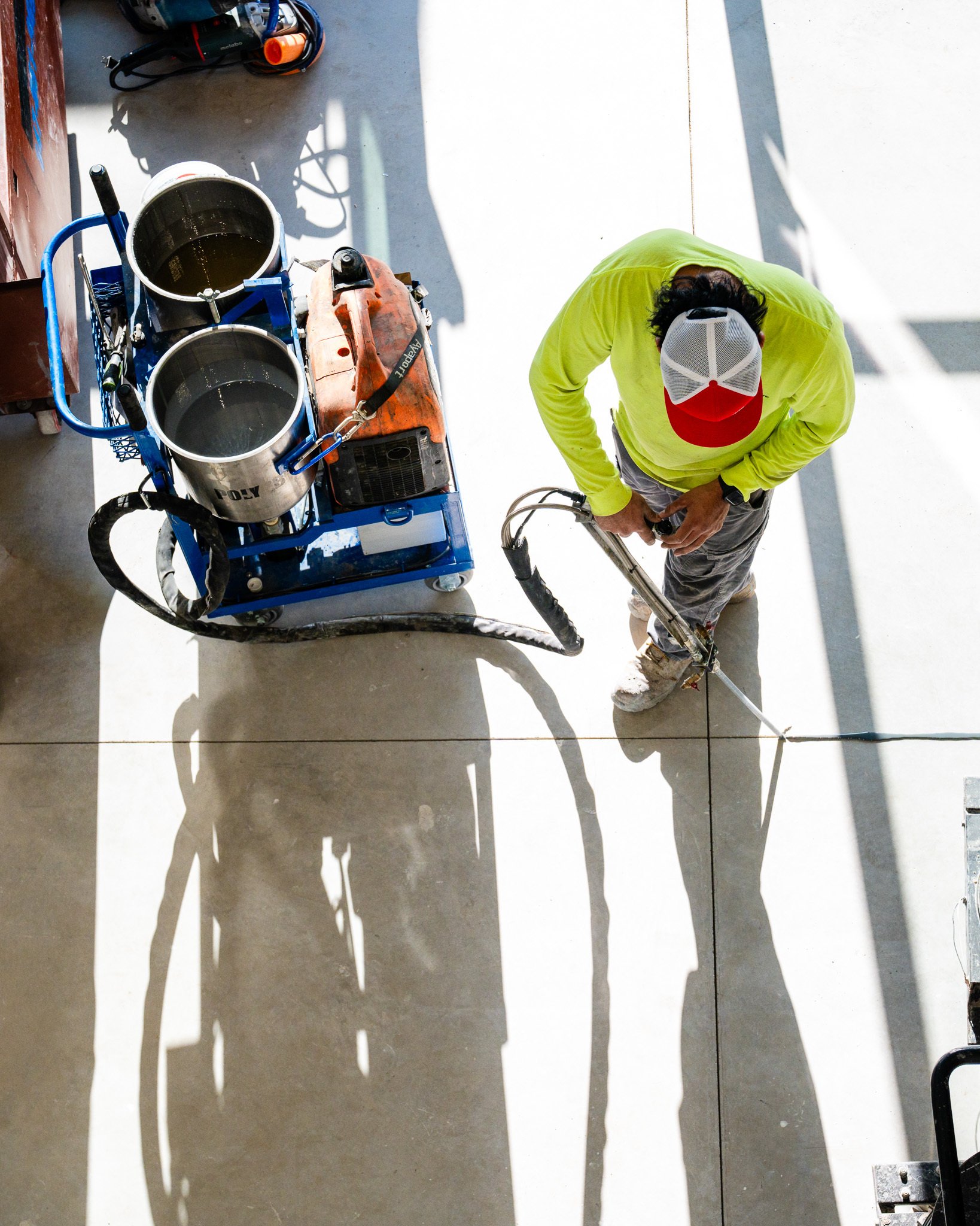 Flooring contractor repairing joints