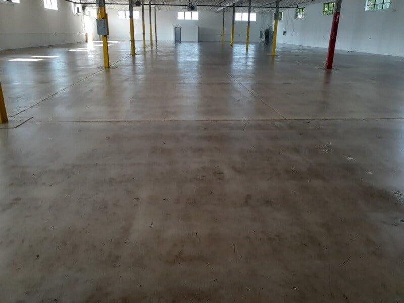 GRIND AND SEAL ACRYLIC flooring in a warehouse space in chicago