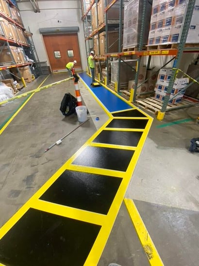 concrete coating being applied