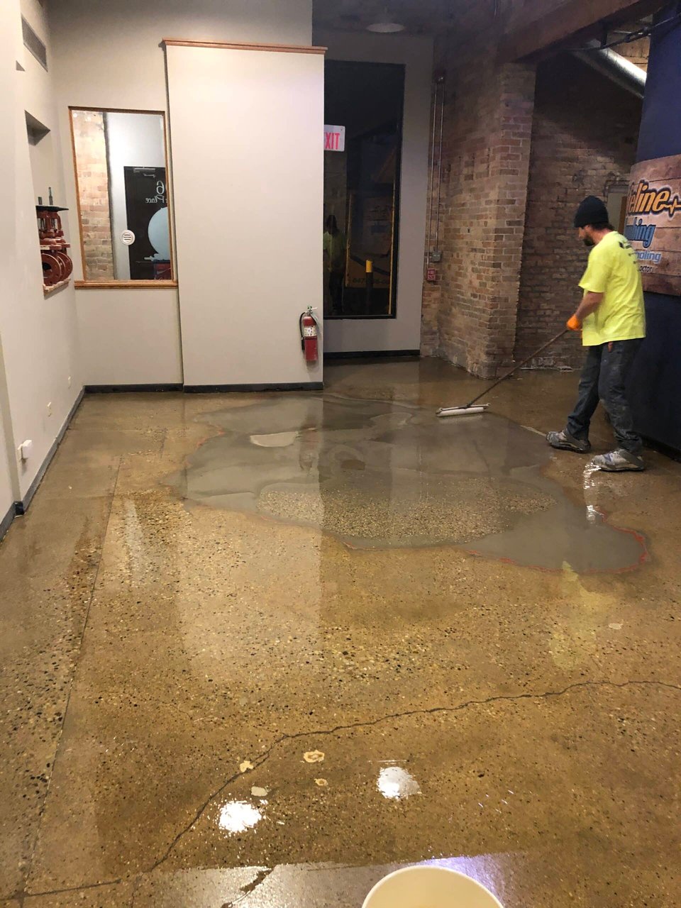 Worker installs an epoxy floor