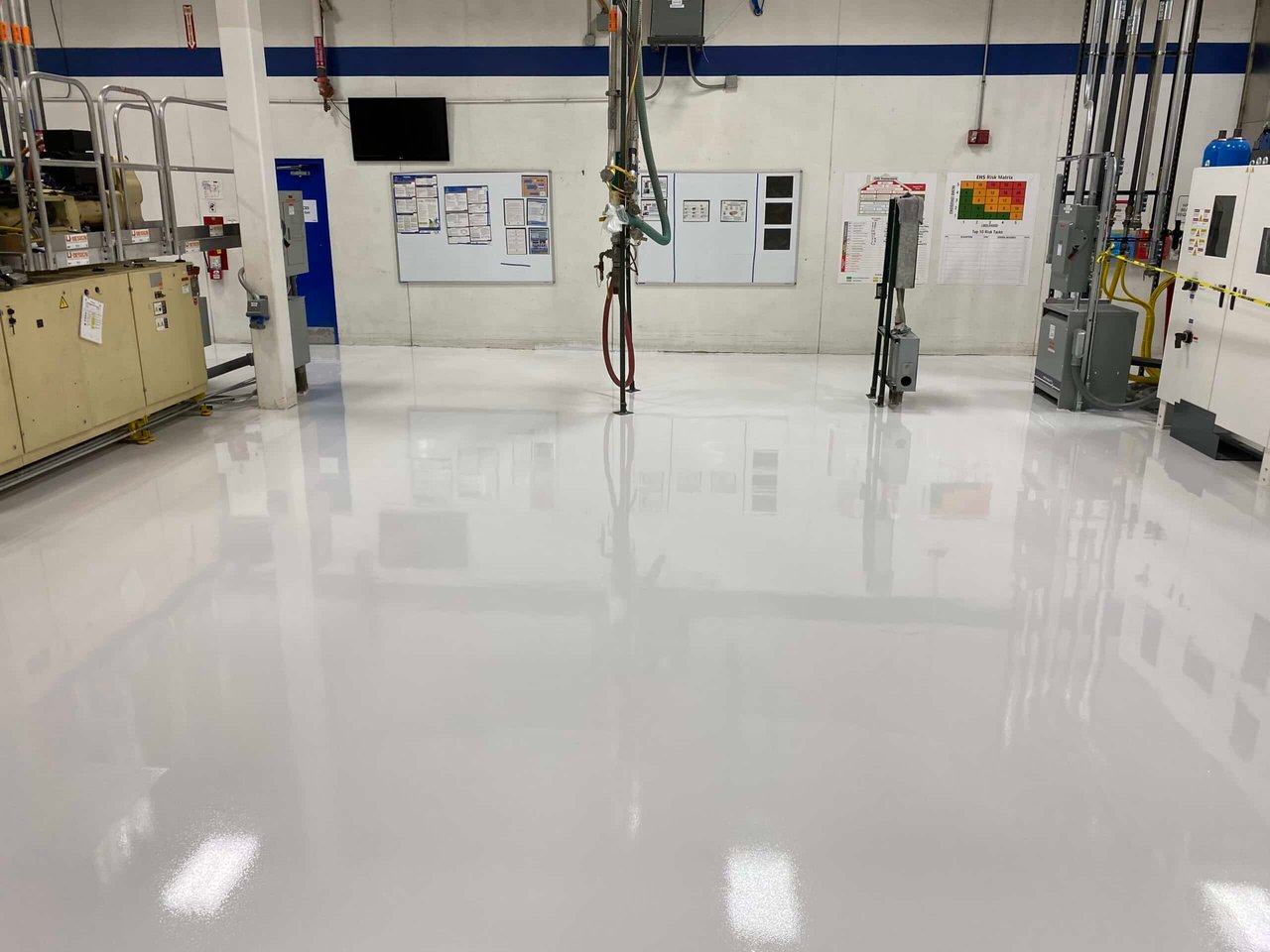 white epoxy flooring in a factory setting