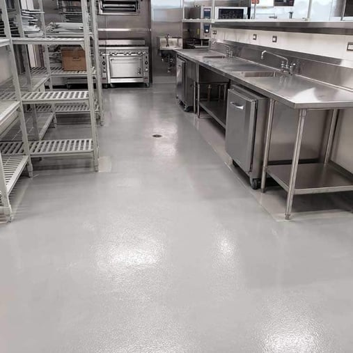 grey urethane cement floor in a professional kitchen