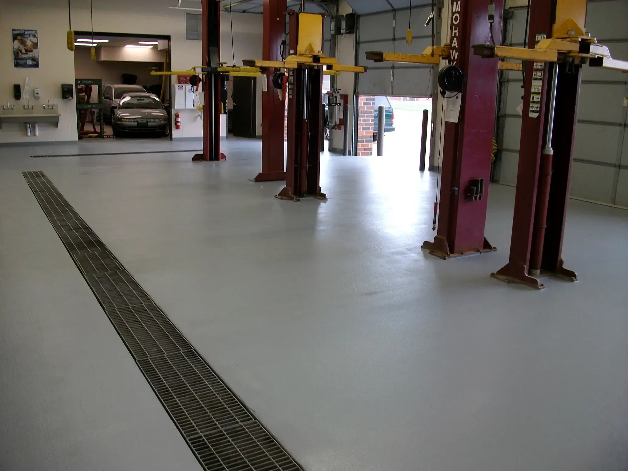 Epoxy Image floor in a manufacturing facility with drainage feature