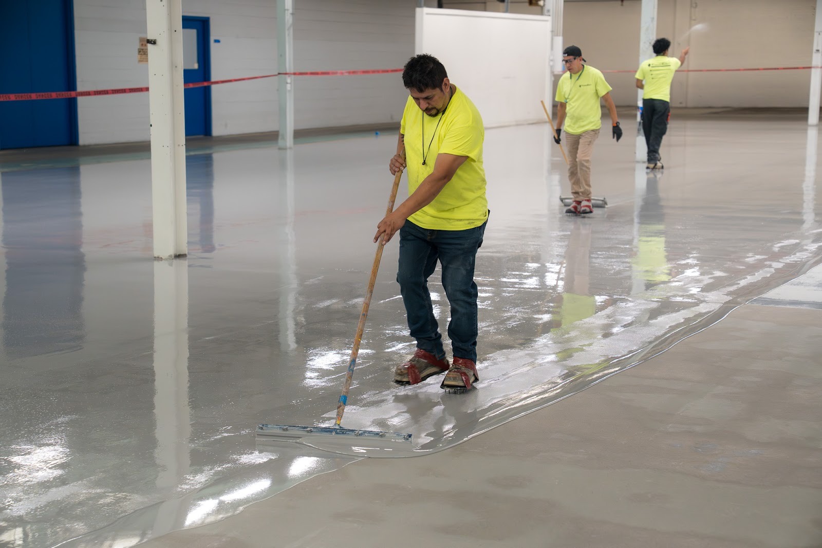 Applying epoxy to the concrete